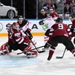 PRAGUE, CZECH REPUBLIC - MAY 1: Canada 's Nathan Mackinnon #29 with a scoring chance against Latvia's Ervins Mustukovs #33 while Jason Spezza #90, Janis Sprukts #5, Krisjanis Redlihs #9 and Aleksandrs Jerofejevs #23 look on during preliminary round action at the 2015 IIHF Ice Hockey World Championship. (Photo by Andre Ringuette/HHOF-IIHF Images)

